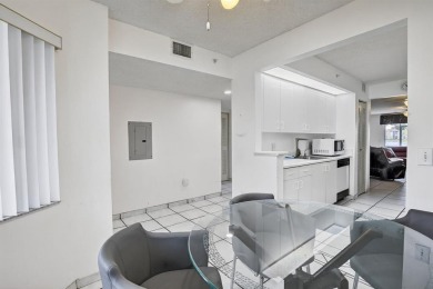 Enjoy lakefront living in the newest section of Century Village on Flamingo Lakes Country Club in Florida - for sale on GolfHomes.com, golf home, golf lot