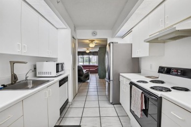 Enjoy lakefront living in the newest section of Century Village on Flamingo Lakes Country Club in Florida - for sale on GolfHomes.com, golf home, golf lot