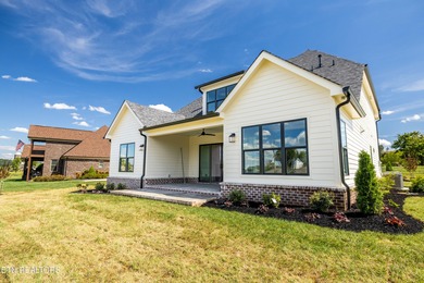 This beautifully appointed 4-bedroom, 3-bath residence offers 3 on Tennessee National Golf Club in Tennessee - for sale on GolfHomes.com, golf home, golf lot