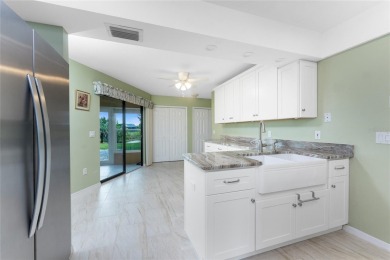What a view - as soon as you walk in the front door - right down on Rotonda Golf and Country Club The Palms Course in Florida - for sale on GolfHomes.com, golf home, golf lot