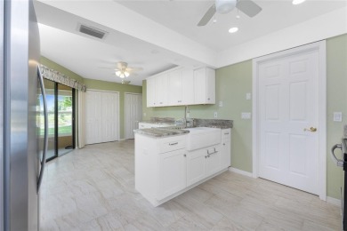 What a view - as soon as you walk in the front door - right down on Rotonda Golf and Country Club The Palms Course in Florida - for sale on GolfHomes.com, golf home, golf lot