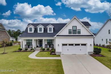 Built in 2022 in the sought-after Cape Fear National section of on Cape Fear National At Brunswick Forest in North Carolina - for sale on GolfHomes.com, golf home, golf lot