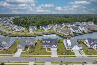 Built in 2022 in the sought-after Cape Fear National section of on Cape Fear National At Brunswick Forest in North Carolina - for sale on GolfHomes.com, golf home, golf lot