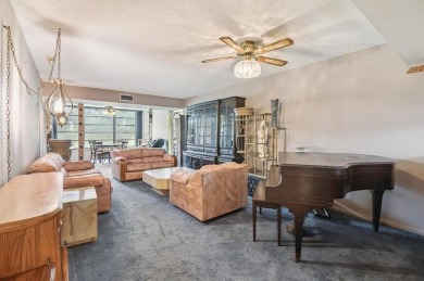 Ready for a remodel; Lovely golf course views from this spacious on Pine Island Ridge Country Club in Florida - for sale on GolfHomes.com, golf home, golf lot