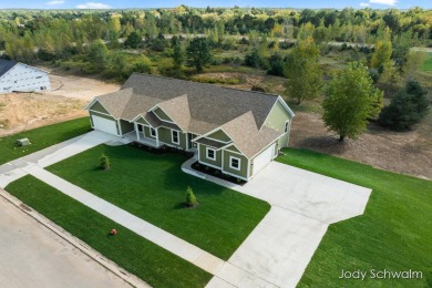 Welcome home to Ranney Village, where you'll find a bright and on Candlestone Inn  and Golf Resort in Michigan - for sale on GolfHomes.com, golf home, golf lot