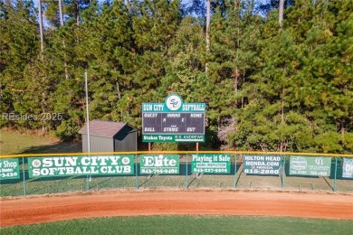 Imagine sipping your morning coffee while overlooking the 13th on Okatie Creek Golf Club in South Carolina - for sale on GolfHomes.com, golf home, golf lot