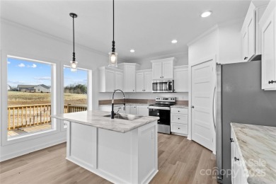 Located in the River Rock neighborhood, this brand new home on River Oaks Country Club in North Carolina - for sale on GolfHomes.com, golf home, golf lot