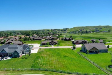 This flat building site located at the Powder Horn is over a 1/2 on The Powder Horn Golf Club - Mountain in Wyoming - for sale on GolfHomes.com, golf home, golf lot