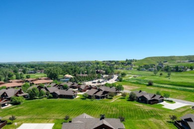 This flat building site located at the Powder Horn is over a 1/2 on The Powder Horn Golf Club - Mountain in Wyoming - for sale on GolfHomes.com, golf home, golf lot