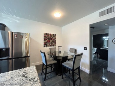 Stylish 2-Bed, 2-Bath Condo in a Gated Community Next to Desert on Desert Rose Golf Course in Nevada - for sale on GolfHomes.com, golf home, golf lot