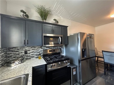 Stylish 2-Bed, 2-Bath Condo in a Gated Community Next to Desert on Desert Rose Golf Course in Nevada - for sale on GolfHomes.com, golf home, golf lot