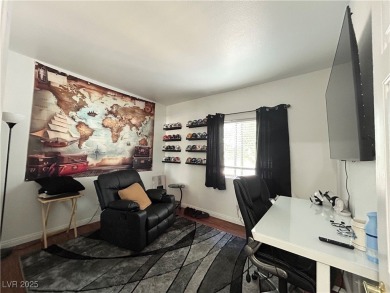 Stylish 2-Bed, 2-Bath Condo in a Gated Community Next to Desert on Desert Rose Golf Course in Nevada - for sale on GolfHomes.com, golf home, golf lot