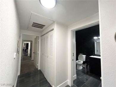 Stylish 2-Bed, 2-Bath Condo in a Gated Community Next to Desert on Desert Rose Golf Course in Nevada - for sale on GolfHomes.com, golf home, golf lot