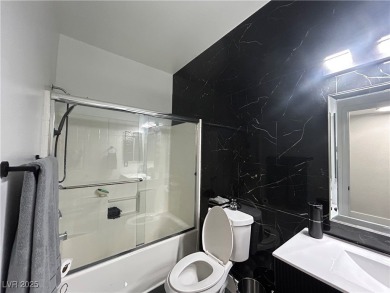 Stylish 2-Bed, 2-Bath Condo in a Gated Community Next to Desert on Desert Rose Golf Course in Nevada - for sale on GolfHomes.com, golf home, golf lot