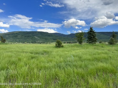 Enjoy fantastic full valley and eastern views of Teton foothills on Targhee Village Golf Course in Wyoming - for sale on GolfHomes.com, golf home, golf lot