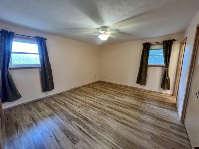 Super clean brick 3 bedroom, 2 bath home with golf course views on Twin Lakes Golf Club in Arkansas - for sale on GolfHomes.com, golf home, golf lot