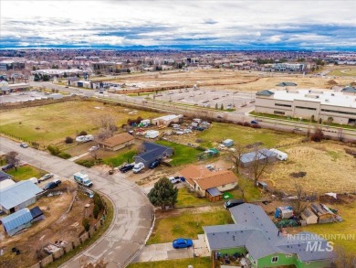 This one acre parcel backs to Silverstone Way in Eagle Common on Meadow Lake Village and Golf Course in Idaho - for sale on GolfHomes.com, golf home, golf lot