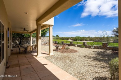 Enter this outstanding property through an exquisite handcrafted on Sonoma Ranch Golf Course in New Mexico - for sale on GolfHomes.com, golf home, golf lot