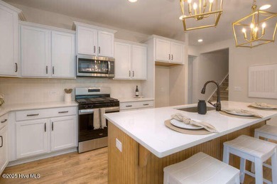 Welcome to this beautifully appointed 4-bedroom, 3-bath home on Carolina National Golf Club in North Carolina - for sale on GolfHomes.com, golf home, golf lot