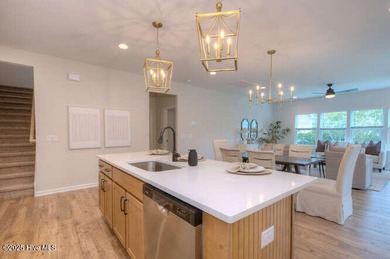 Welcome to this beautifully appointed 4-bedroom, 3-bath home on Carolina National Golf Club in North Carolina - for sale on GolfHomes.com, golf home, golf lot