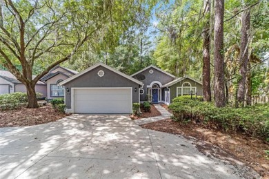 This lovely home is located in a cul-de-sac in charming Camden on Haile Plantation Golf and Country Club in Florida - for sale on GolfHomes.com, golf home, golf lot