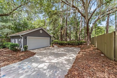 This lovely home is located in a cul-de-sac in charming Camden on Haile Plantation Golf and Country Club in Florida - for sale on GolfHomes.com, golf home, golf lot