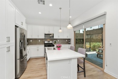 This modern turnkey home features three bedrooms, two and a half on Glen Ivy Golf Club in California - for sale on GolfHomes.com, golf home, golf lot