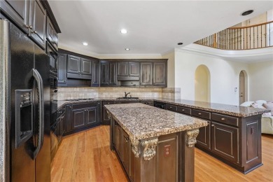 Experience three fully finished levels of exceptional living on The Golf Club of Georgia in Georgia - for sale on GolfHomes.com, golf home, golf lot