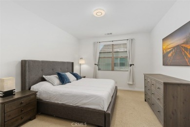 This modern turnkey home features three bedrooms, two and a half on Glen Ivy Golf Club in California - for sale on GolfHomes.com, golf home, golf lot