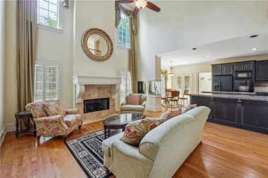 Experience three fully finished levels of exceptional living on The Golf Club of Georgia in Georgia - for sale on GolfHomes.com, golf home, golf lot