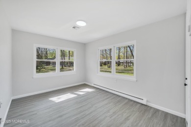 Immaculately renovated end-unit gem in the gated Leisure Village on Greenbriar Woodlands in New Jersey - for sale on GolfHomes.com, golf home, golf lot