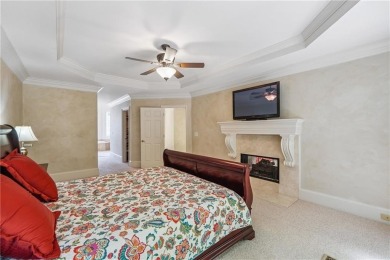 Experience three fully finished levels of exceptional living on The Golf Club of Georgia in Georgia - for sale on GolfHomes.com, golf home, golf lot