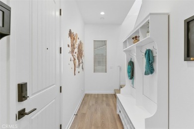 This modern turnkey home features three bedrooms, two and a half on Glen Ivy Golf Club in California - for sale on GolfHomes.com, golf home, golf lot