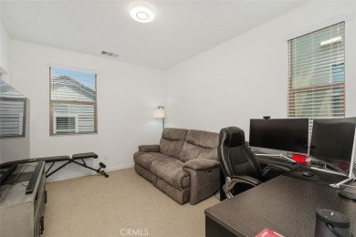 This modern turnkey home features three bedrooms, two and a half on Glen Ivy Golf Club in California - for sale on GolfHomes.com, golf home, golf lot