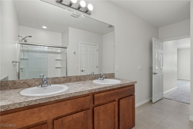 Welcome to your dream home in the highly sought-after Entrada on Sabal Springs Golf and Racquet Club in Florida - for sale on GolfHomes.com, golf home, golf lot