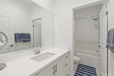 This modern turnkey home features three bedrooms, two and a half on Glen Ivy Golf Club in California - for sale on GolfHomes.com, golf home, golf lot