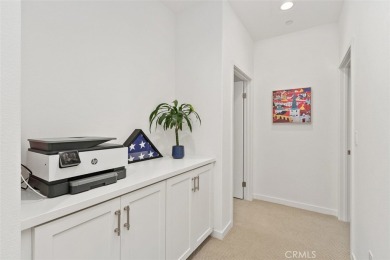 This modern turnkey home features three bedrooms, two and a half on Glen Ivy Golf Club in California - for sale on GolfHomes.com, golf home, golf lot