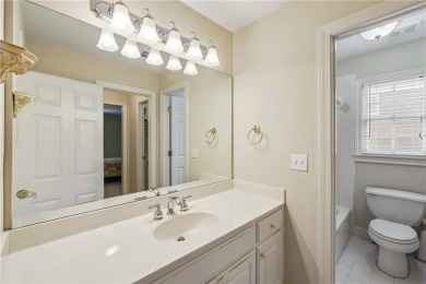 Experience three fully finished levels of exceptional living on The Golf Club of Georgia in Georgia - for sale on GolfHomes.com, golf home, golf lot