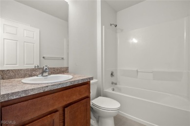 Welcome to your dream home in the highly sought-after Entrada on Sabal Springs Golf and Racquet Club in Florida - for sale on GolfHomes.com, golf home, golf lot