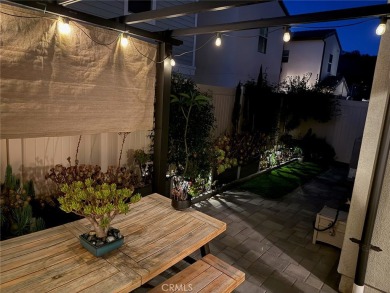 This modern turnkey home features three bedrooms, two and a half on Glen Ivy Golf Club in California - for sale on GolfHomes.com, golf home, golf lot