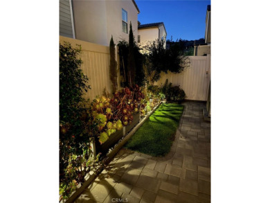 This modern turnkey home features three bedrooms, two and a half on Glen Ivy Golf Club in California - for sale on GolfHomes.com, golf home, golf lot