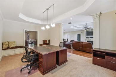 Experience three fully finished levels of exceptional living on The Golf Club of Georgia in Georgia - for sale on GolfHomes.com, golf home, golf lot