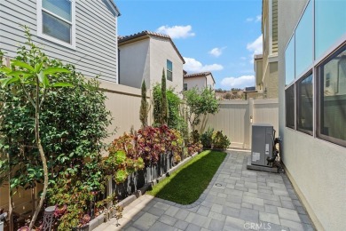 This modern turnkey home features three bedrooms, two and a half on Glen Ivy Golf Club in California - for sale on GolfHomes.com, golf home, golf lot