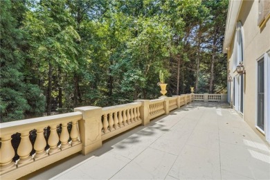 Experience three fully finished levels of exceptional living on The Golf Club of Georgia in Georgia - for sale on GolfHomes.com, golf home, golf lot