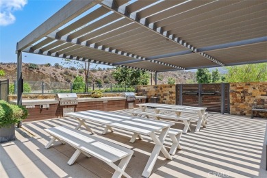This modern turnkey home features three bedrooms, two and a half on Glen Ivy Golf Club in California - for sale on GolfHomes.com, golf home, golf lot