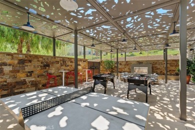 This modern turnkey home features three bedrooms, two and a half on Glen Ivy Golf Club in California - for sale on GolfHomes.com, golf home, golf lot