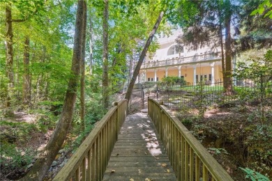Experience three fully finished levels of exceptional living on The Golf Club of Georgia in Georgia - for sale on GolfHomes.com, golf home, golf lot