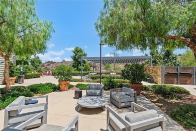 This modern turnkey home features three bedrooms, two and a half on Glen Ivy Golf Club in California - for sale on GolfHomes.com, golf home, golf lot