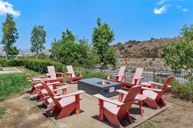 This modern turnkey home features three bedrooms, two and a half on Glen Ivy Golf Club in California - for sale on GolfHomes.com, golf home, golf lot