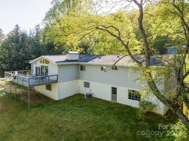 Perched on the 16th fairway of the prestigious Country Club of on Country Club of Asheville in North Carolina - for sale on GolfHomes.com, golf home, golf lot